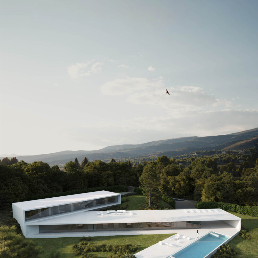 Aerial view of Villa 95, a modern white luxury villa with a pool in a green Sotogrande landscape.