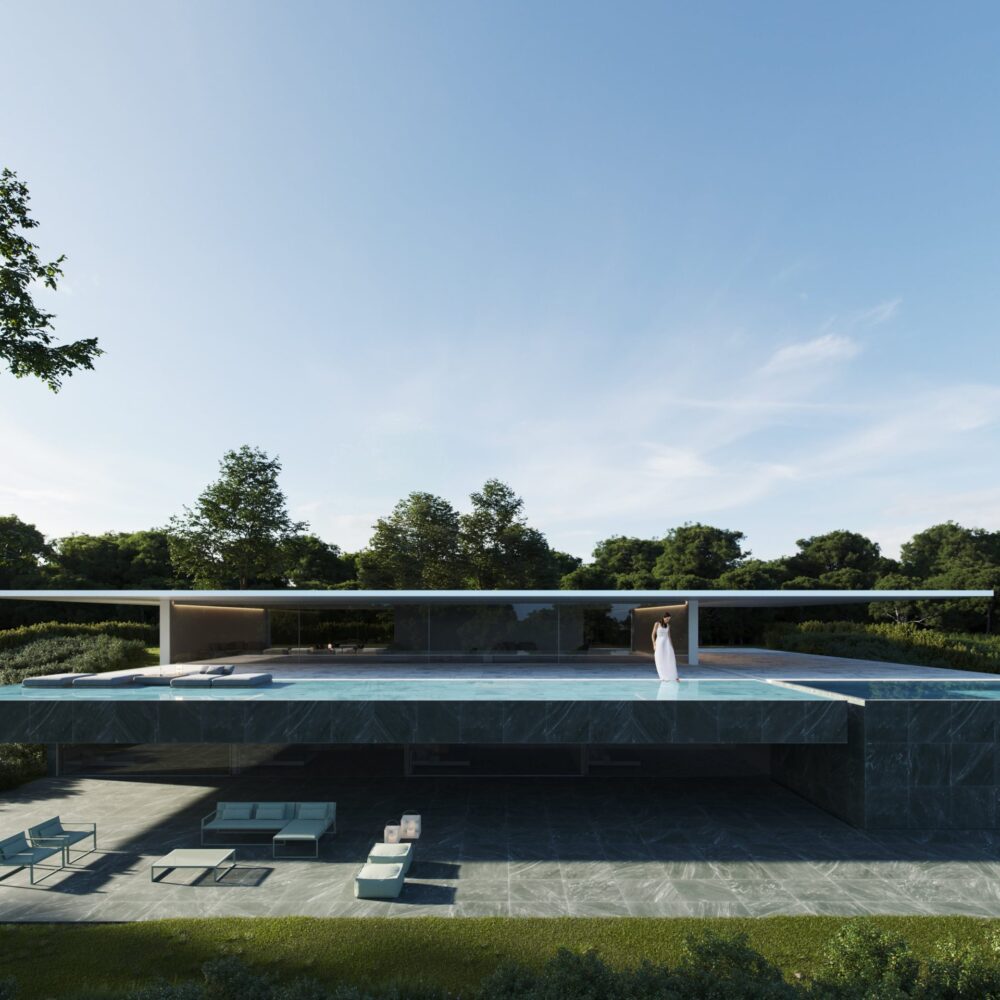 Moderna Villa 46 en Sotogrande con piscina infinita, zonas lounge exteriores y vegetación.