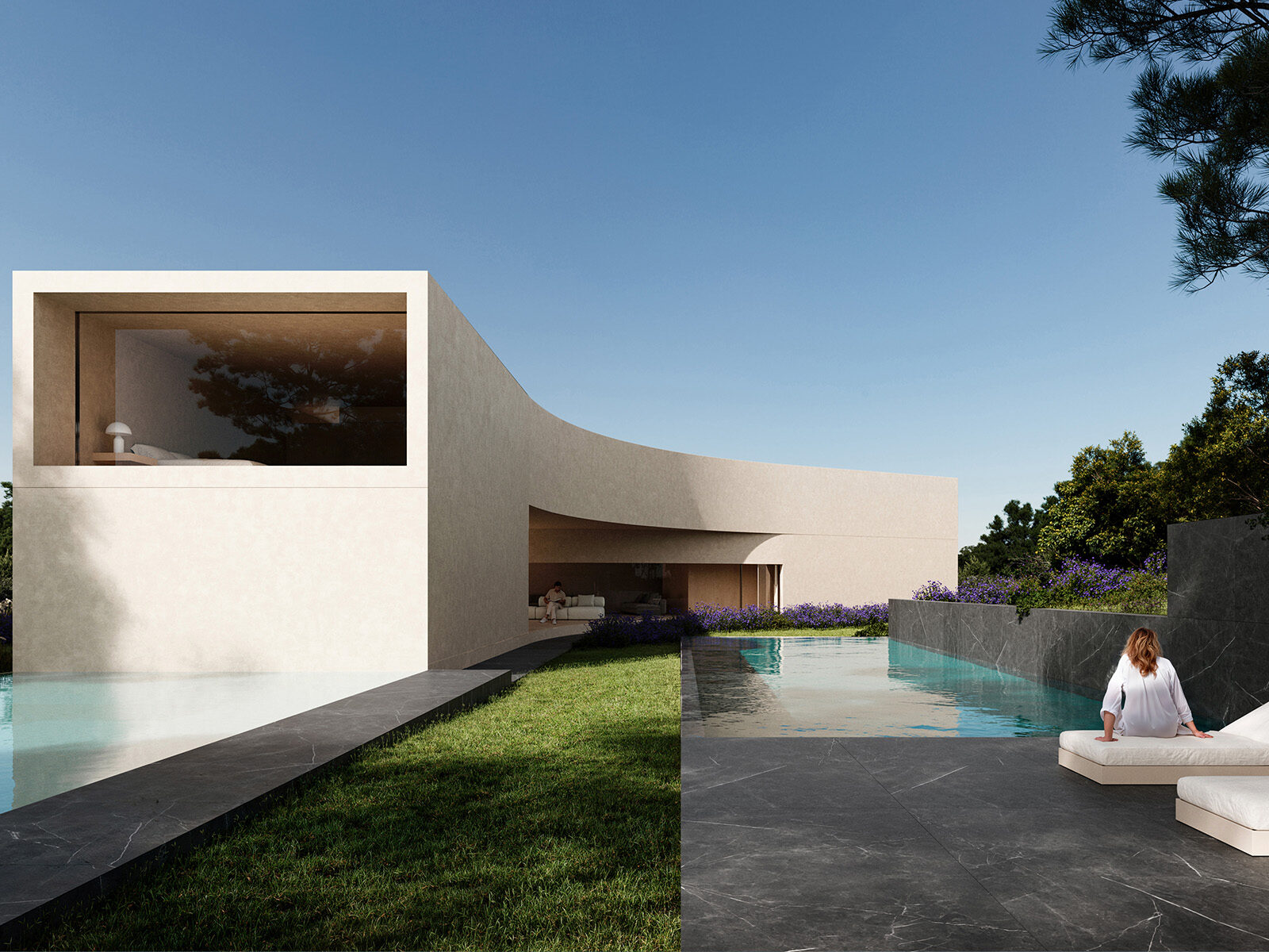 Modern Sotogrande villa with a pool, dark tiled patio, green lawn, and a person relaxing on a lounge chair.