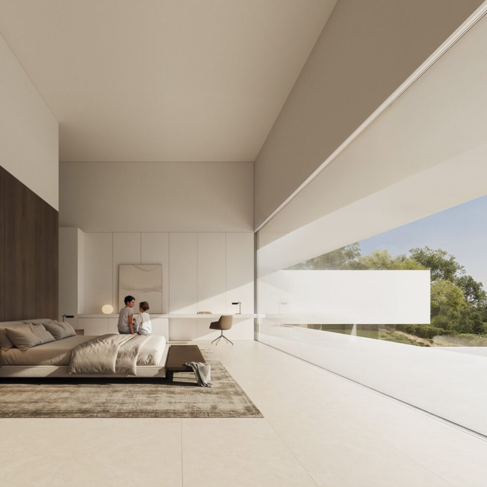 Modern bedroom with an adult and child on the bed and large windows to a lush green view.